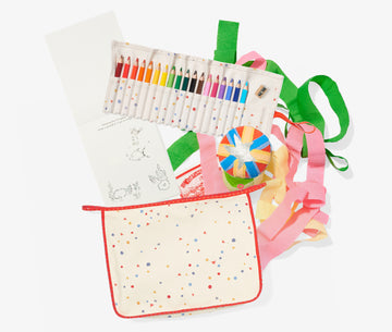 Color pencils, surprise ball, coloring book coming out of zip bag